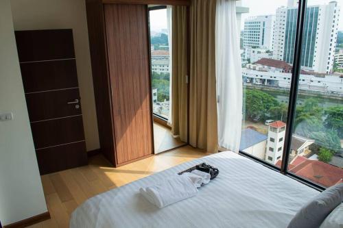 Postel nebo postele na pokoji v ubytování Lovely 1-Bedroom condo near Night Barzaar