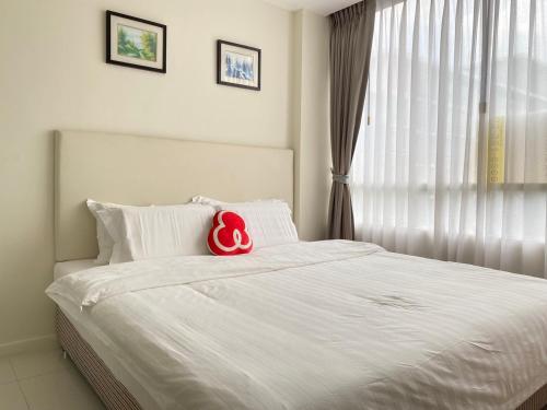 Tempat tidur dalam kamar di Elements Srinakarin