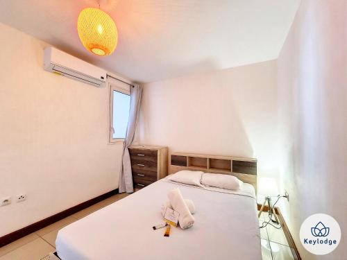 Un ou plusieurs lits dans un hébergement de l'établissement Kheyl Home 2 étoiles - T3 de 47 m2 à Saint-Denis