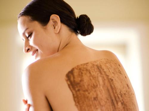 a woman with her back to the camera at Taj Holiday Village Resort & Spa, Goa in Candolim