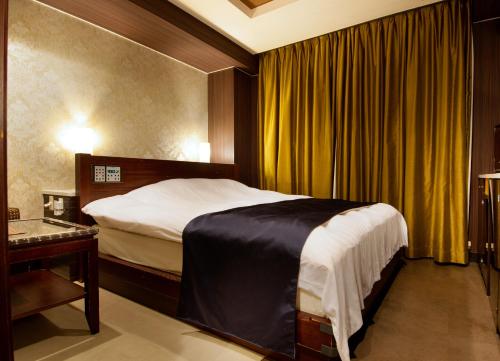 Cama ou camas em um quarto em HOTEL ZERO