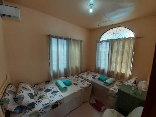 Katil atau katil-katil dalam bilik di Haira Traveller's Home