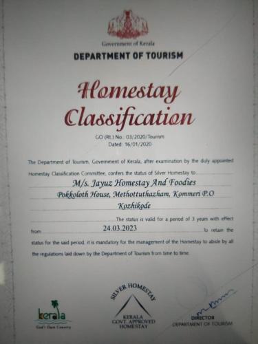 a white piece of paper with a certificate of tournament at Jayuz Homestay & Foodies in Kozhikode