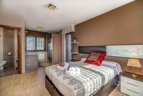 Postel nebo postele na pokoji v ubytování Casa Tomillar