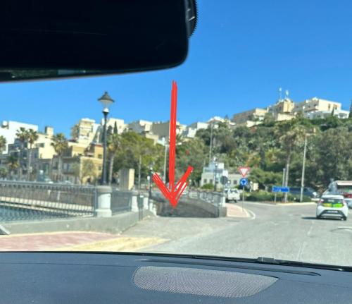a view of a road with a red x on the road at Apartment 1 Vecca in St Paul's Bay