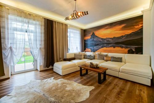 Гостиная зона в AusZeit Steiraland 1 mit privaten Garten überdachter Terrasse und Parken