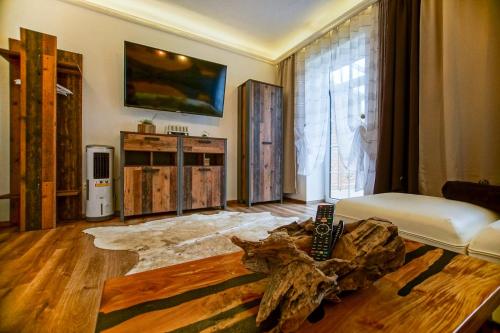 Кровать или кровати в номере AusZeit Steiraland 1 mit privaten Garten überdachter Terrasse und Parken