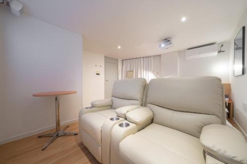 Posezení v ubytování Aank Hotel Guri