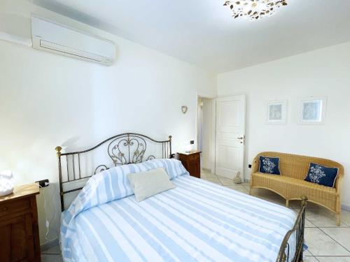 Ένα ή περισσότερα κρεβάτια σε δωμάτιο στο Casa L'Approdo - ArgonautiVacanze