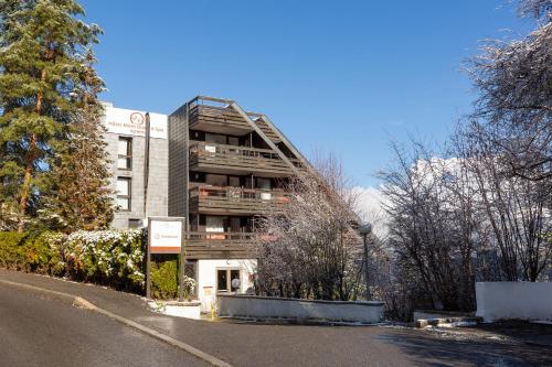 a building on the side of a street at SOWELL HOTELS Mont Blanc et SPA in Saint-Gervais-les-Bains