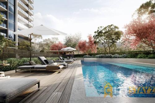 a swimming pool with chaise lounge chairs next to a building at Fab in Phillip - 2bd 2bth Apt - Close to CBR Hospital in Phillip