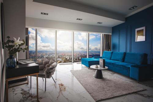 Гостиная зона в In The Sky - Apartamenty w Sky Tower