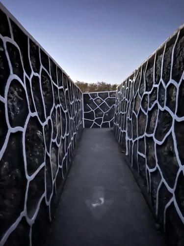 an image of a bridge with a fence at Second Hostel in Xiaoliuqiu