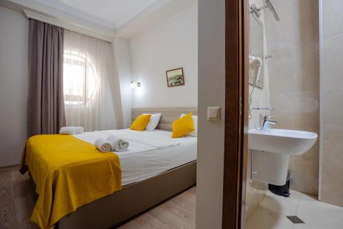 Katil atau katil-katil dalam bilik di Daisi Sunset Hotel