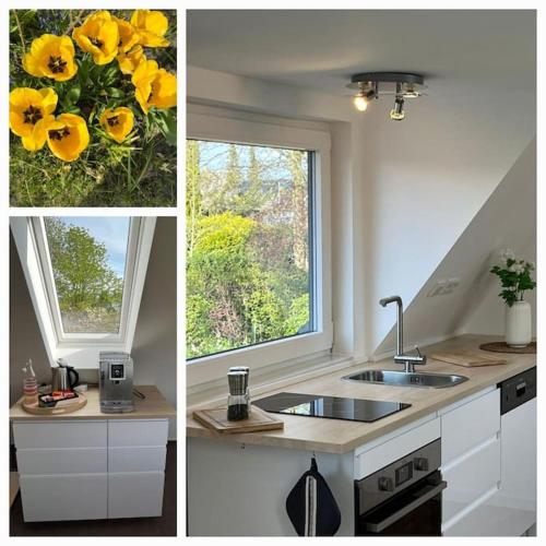 a kitchen with a sink and a window at Idyllisches Ferienhäuschen Rendsburg in Rendsburg