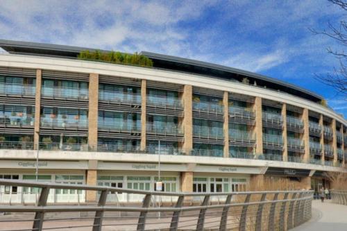 a large building with a lot of windows at Bond Street Luxury Apartment Central Chelmsford in Chelmsford