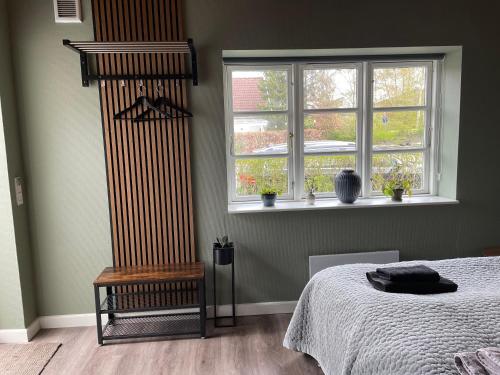 Postel nebo postele na pokoji v ubytování Jonstrupvejens Apartments Lejl C