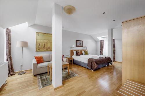 Ein Bett oder Betten in einem Zimmer der Unterkunft Euterpe Hotel