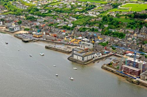 an aerial view of a city with boats in the water at Ardsallagh Lodge in Youghal