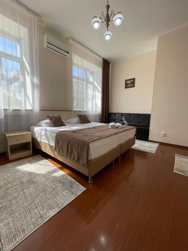 Кровать или кровати в номере Belon Land
