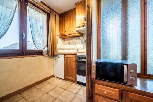 Kuchyň nebo kuchyňský kout v ubytování Studio Chénives - Morzine