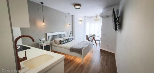 Postel nebo postele na pokoji v ubytování Elegante estudio frente a la playa