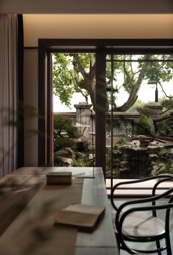 Posezení v ubytování Hangzhou Qiushui Villa