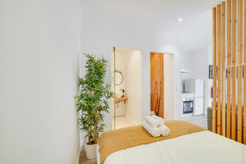 a bedroom with a bed with two teddy bears on it at Alvito Charm Apartments in Lisbon