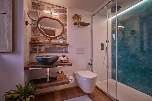 a bathroom with a sink and a shower at "La Casa dei Gelsi" - Panorama Lodge by Stay Generous in Scudellate
