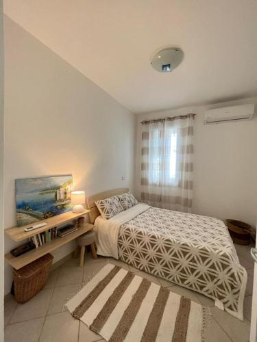 Ένα ή περισσότερα κρεβάτια σε δωμάτιο στο Villa sul Mare