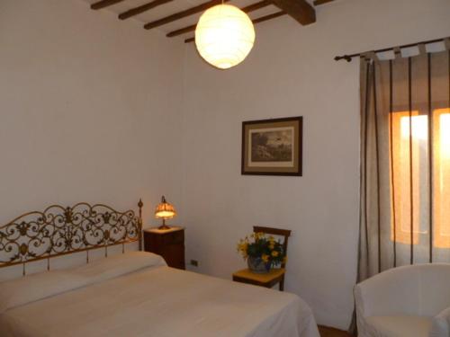 Llit o llits en una habitació de Della Genga Resort