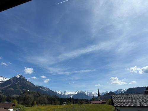 a view of the mountains from a house at Haus Anna in Fischen