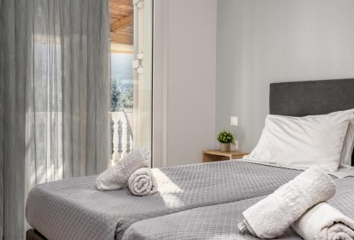 Ένα ή περισσότερα κρεβάτια σε δωμάτιο στο Zen Villa