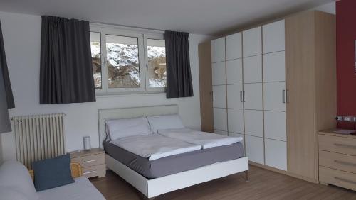 Postel nebo postele na pokoji v ubytování Villa Treccani Apartments