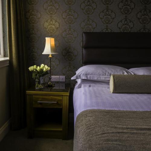 Katil atau katil-katil dalam bilik di International Hotel Killarney