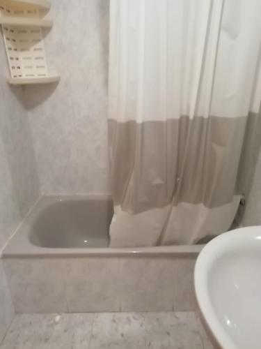 a bathroom with a shower and a sink at Apartamento en Isla Playa in Isla