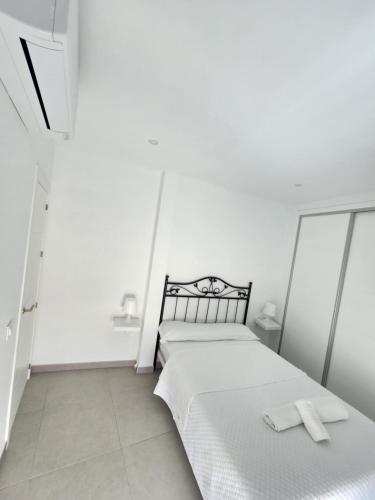 Postel nebo postele na pokoji v ubytování Apartamento Centro Ronda 1