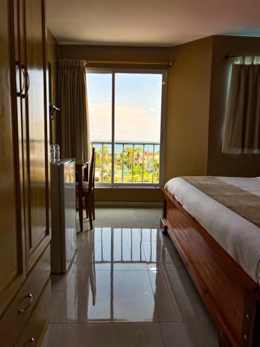 Katil atau katil-katil dalam bilik di Apart Hotel Hamilton