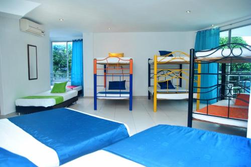 Postel nebo postele na pokoji v ubytování Ayenda Hotel Roisa