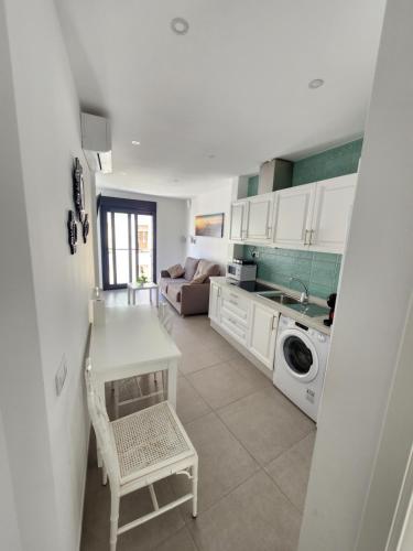 Kuchyň nebo kuchyňský kout v ubytování Apartamentos Centro Ronda 3