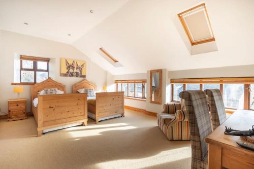 a large room with a bedroom and a living room at The Shed in Durham