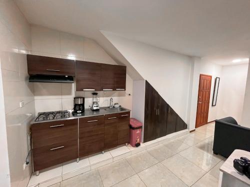 مطبخ أو مطبخ صغير في Hermoso y acogedor apartamento