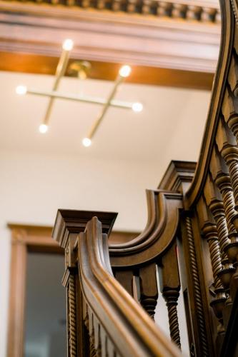 a close up of a wooden stair railing at Wilbur Mansion in Bethlehem