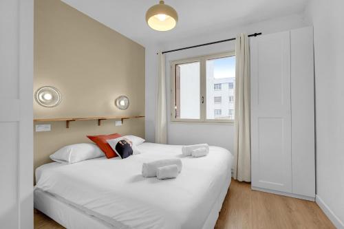 Posteľ alebo postele v izbe v ubytovaní Le Sant Salvador - Appartement près du canal