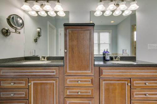 a bathroom with two sinks and a mirror at Spacious Ocean City Home - Walk to Beach! in Ocean City