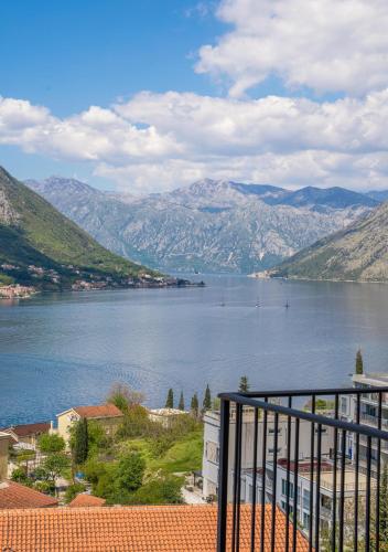 a view of a body of water with mountains at Andjela's Studio in Kotor
