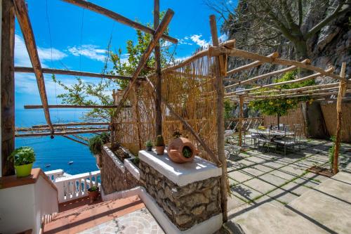 a house with a view of the water at Villa Briganti Seaview Terrace in Positano