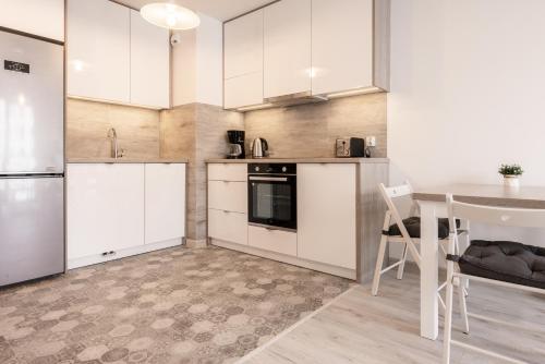 Kjøkken eller kjøkkenkrok på Baltic Apartments Letnica