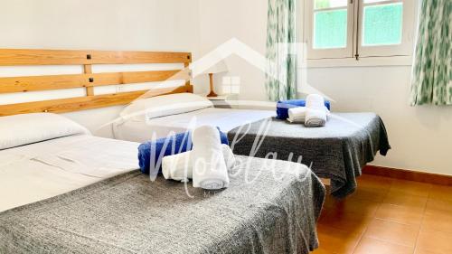 A bed or beds in a room at SA TORRETA 1