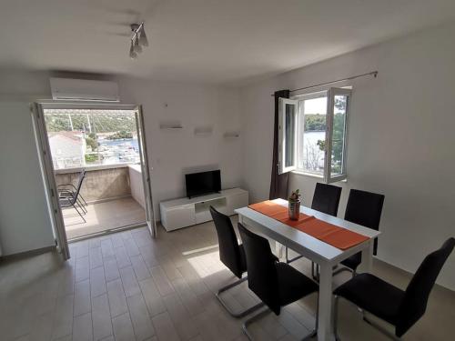 TV a/nebo společenská místnost v ubytování Apartman Janska